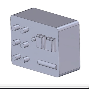 May include: A gray rectangular electronic component with rounded edges. It features several cylindrical knobs, rectangular buttons, and a horizontal bar. The design is a 3D rendering, showcasing a technical or industrial product.