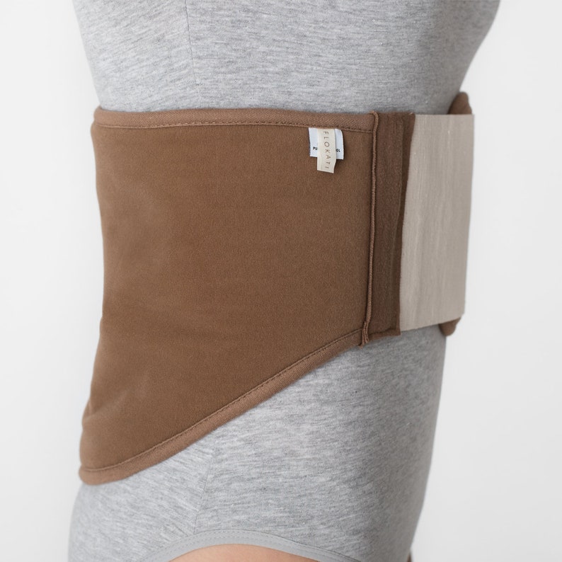 Camel waist belt, warmer with camel wool. Natural camel and merino wool lining with velor is an indispensable helper to relieve unpleasant sensations in the lumbar spine.