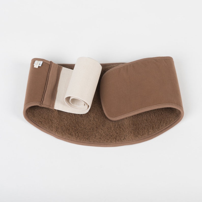 Camel waist belt, warmer with camel wool. Natural camel and merino wool lining with velor is an indispensable helper to relieve unpleasant sensations in the lumbar spine.
