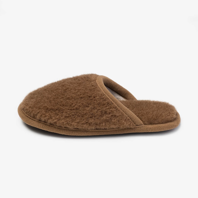 House shoes for women and men from wool. Highest quality house shoes from wool. House slippers for men and women. Merino wool house shoes for women and men.
