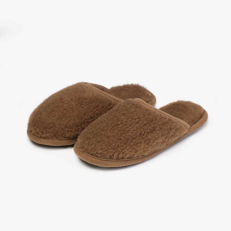 House shoes for women and men from wool. Highest quality house shoes from wool. House slippers for men and women. Merino wool house shoes for women and men.