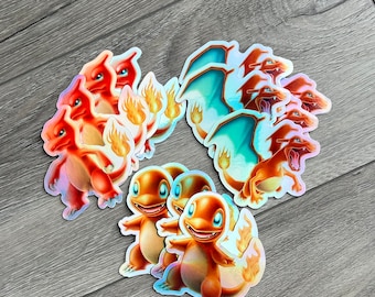 Lot de 3 autocollants holographiques représentant l'évolution de Charmander !