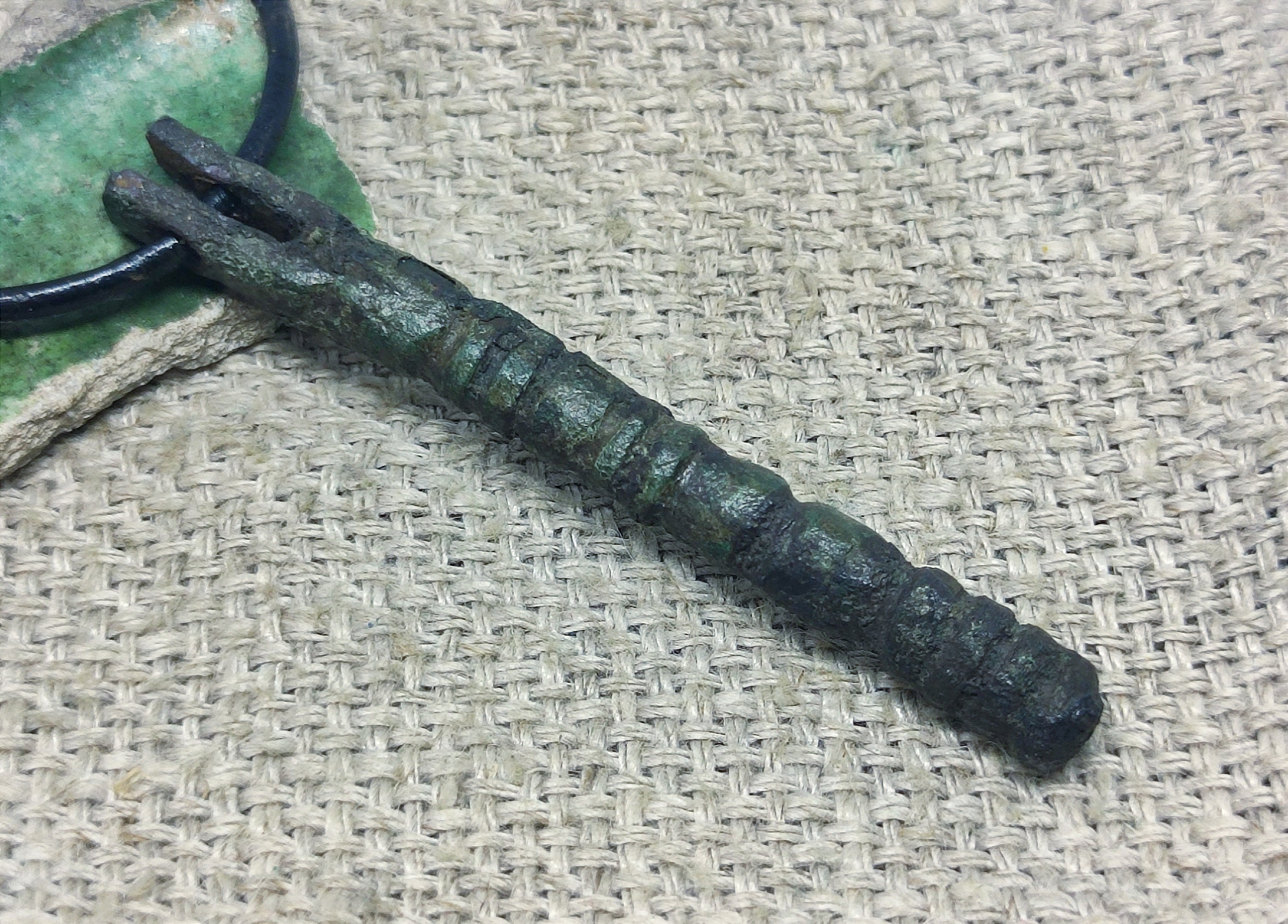 Ancient amulet of the Viking warrior "Battle mace". Historical artifact