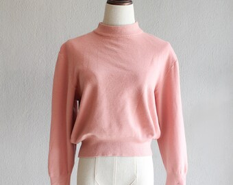 pink woolen jumper
