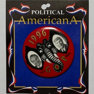 May include: A red, white, and blue political button with a cartoon elephant and the text "GOP 1996" and the names "Dole" and "MACK".