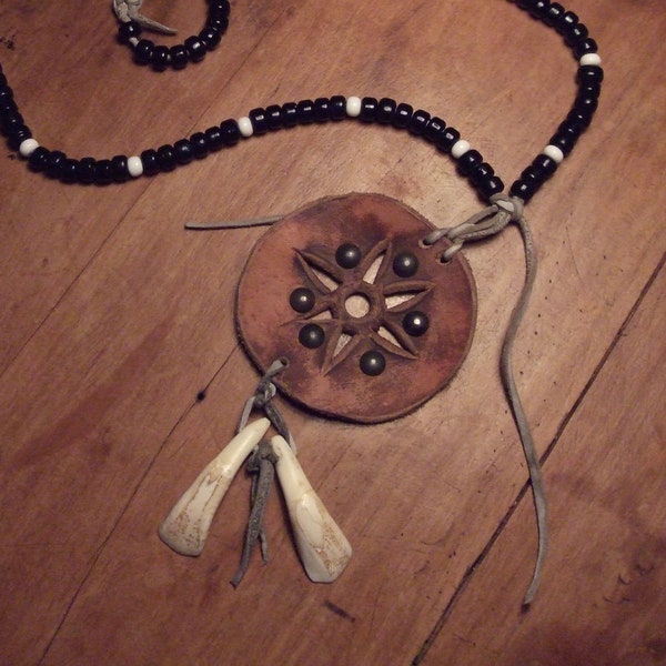 Plains style hide disc necklace with buffalo teeth - amulet - collector's item - non-native reproduction