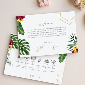 May include: A tropical-themed wedding invitation with a gold geometric design and a welcome message. The invitation includes a timeline of events for the wedding day, including the wedding ceremony, photos and drinks, dinner and toasts, first dance, cake cutting, and fireworks. The date of the wedding is Saturday, August 15th.