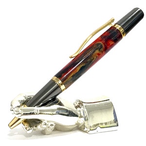 Stunning Hand Turned Retractable Ballpoint Pen. Black Titanium and Gold plated fitments. High Gloss, Glass like, Red Dragon Diamondcast
