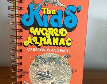 El diario encuadernado con alambre reutilizado Kids World Almanac