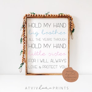 May include: A white printable sign with brown wood frame and wood bead border. The sign reads "Hold my hand big brother all the years through hold my hand little sister for I will always love & protect you".