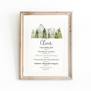 May include: A watercolor print with a forest scene and the name Oliver. The print includes bible verses about being a child of God, made for a purpose, and loved forever.