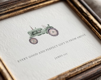 May include: A framed print featuring a watercolor illustration of a green tractor. Below the tractor, the text reads: EVERY GOOD AND PERFECT GIFT IS FROM ABOVE JAMES 1:17. The artwork is enclosed in a dark brown wooden frame with gold accents.