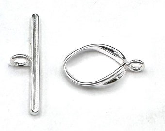 Chiusura a ginocchiera in argento sterling con filo ovale intrecciato. Creazione di gioielli vintage a filo singolo.