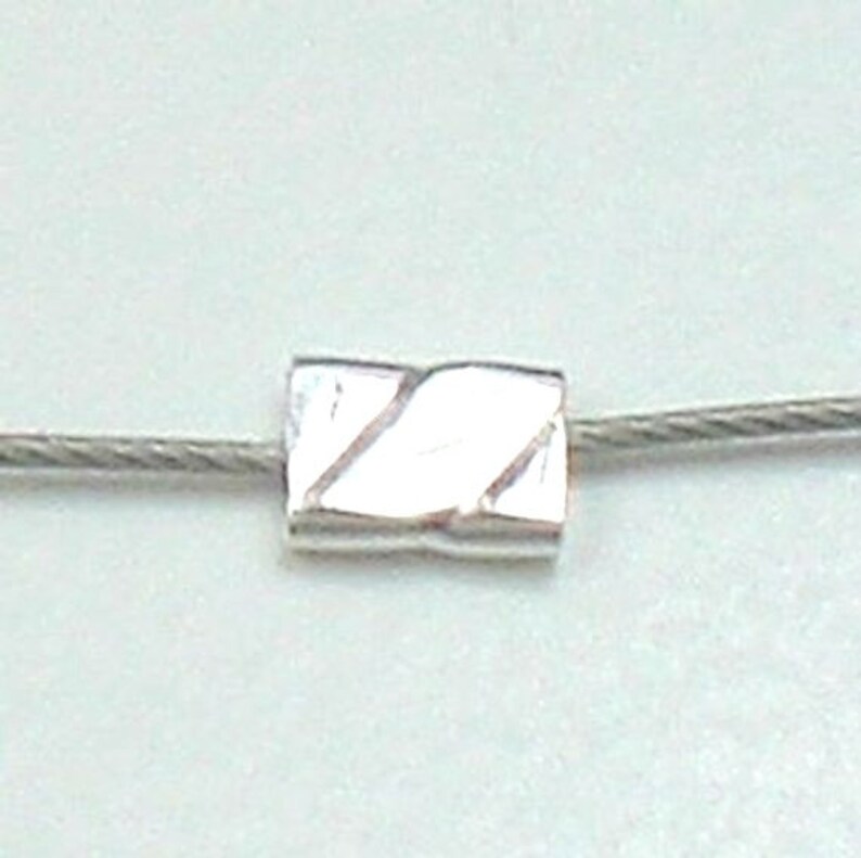 sterling silver crimps Twisted tornado style bead tube 3mm x 2mm jewelry making