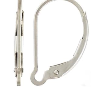 May include: Two silver-colored leverback earring findings. The findings have a curved, hinged design with a hook closure. The metal has a shiny, reflective surface. These earring findings are designed for jewelry making.