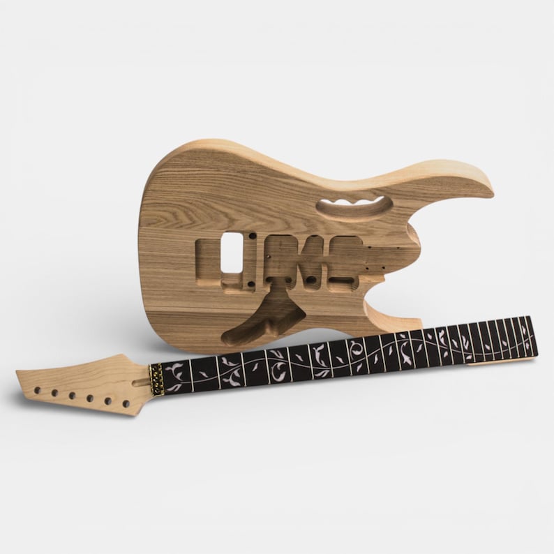 Unfinished electric guitar body and neck. The body is made of ashwood and has a unique shape. The neck is made of maple wood with ebony fretboard.
