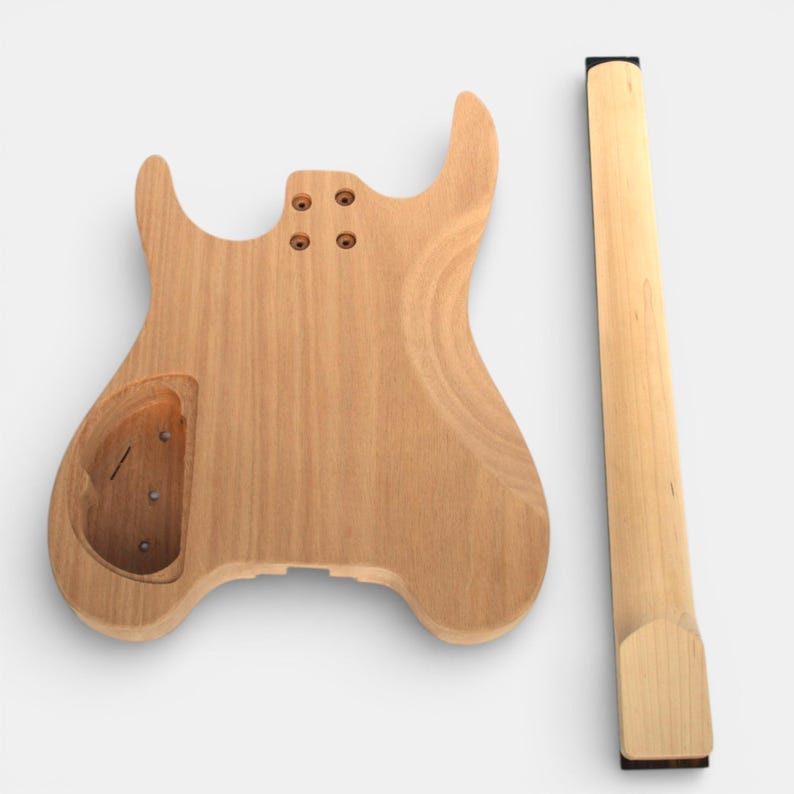 back side of guitar body and guitar neck of headless guitar kit, maple neck with rosewood fretboard and black nut installed by The Guitar Fabrik