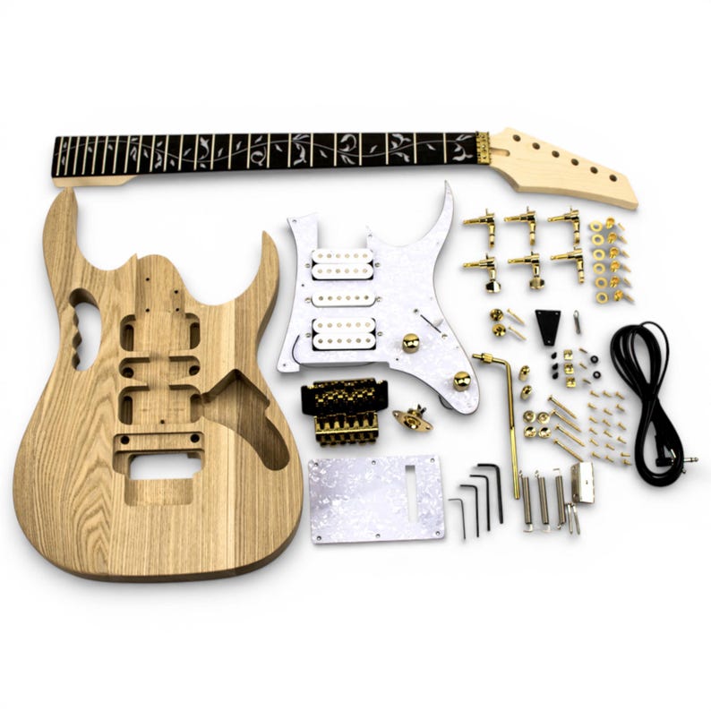 DiY Ibanez Jem guitar kit containing guitar body in ashwood, maple neck with ebony fretboard, hardware in gold colour finish to build your own guitar by The Guitar Fabrik