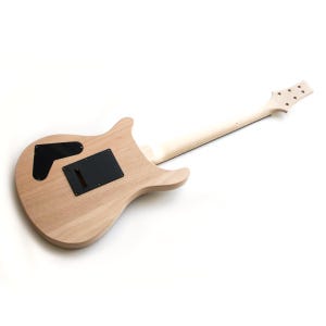 May include: Unfinished natural wood electric guitar with black pickup covers and a black control plate.