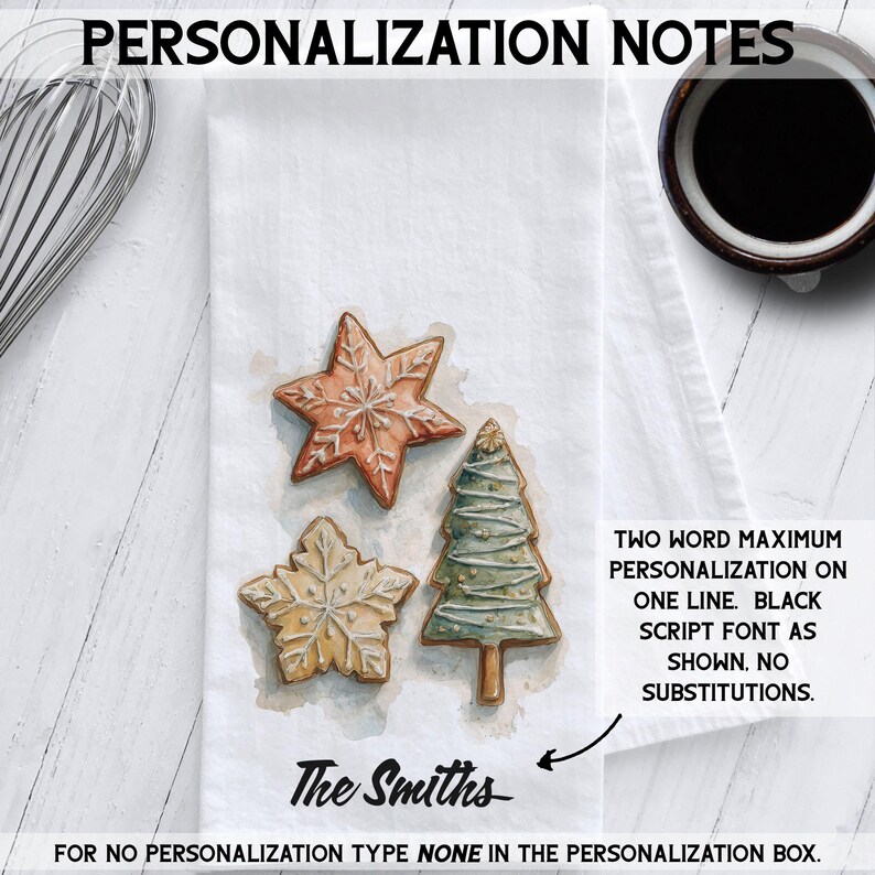 White cotton flour sack tea towel featuring watercolor art of decorated Christmas cookies – star, snowflake, and Christmas tree