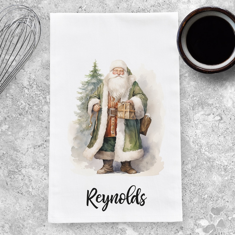 May include: A watercolor illustration of Santa Claus holding a gift, wearing a green coat with white fur trim, and standing next to a green Christmas tree. The text "Reynolds" is printed below the image.