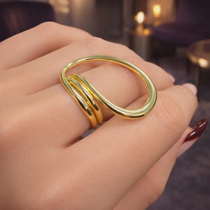 Extra grote gedraaide cocktailring • 18 kt verguld sterlingzilver