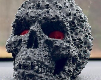 Cráneo de calaveras de ojos rojos