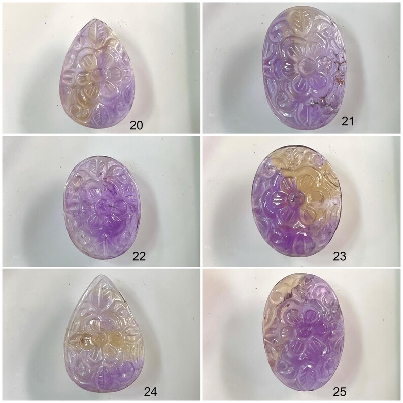 Puede incluir: Seis colgantes de amatista y citrino tallados con dise&ntilde;os florales. Los colgantes son de varias formas, incluyendo gota y &oacute;valo. Las piedras preciosas son una mezcla de morado y amarillo.