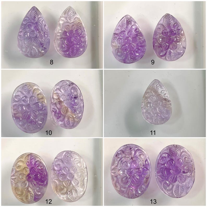 Puede incluir: Un conjunto de 10 cabujones de amatista, tallados con dise&ntilde;os florales. Los cabujones son de varias formas, incluyendo l&aacute;grima y &oacute;valo. Algunos de los cabujones tienen un color de dos tonos, con un centro morado m&aacute;s claro y un borde morado m&aacute;s oscuro.
