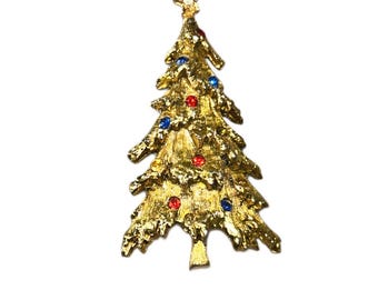 Signed ART Gold-Tone Rhinestone Textured Christmas Tree Pin