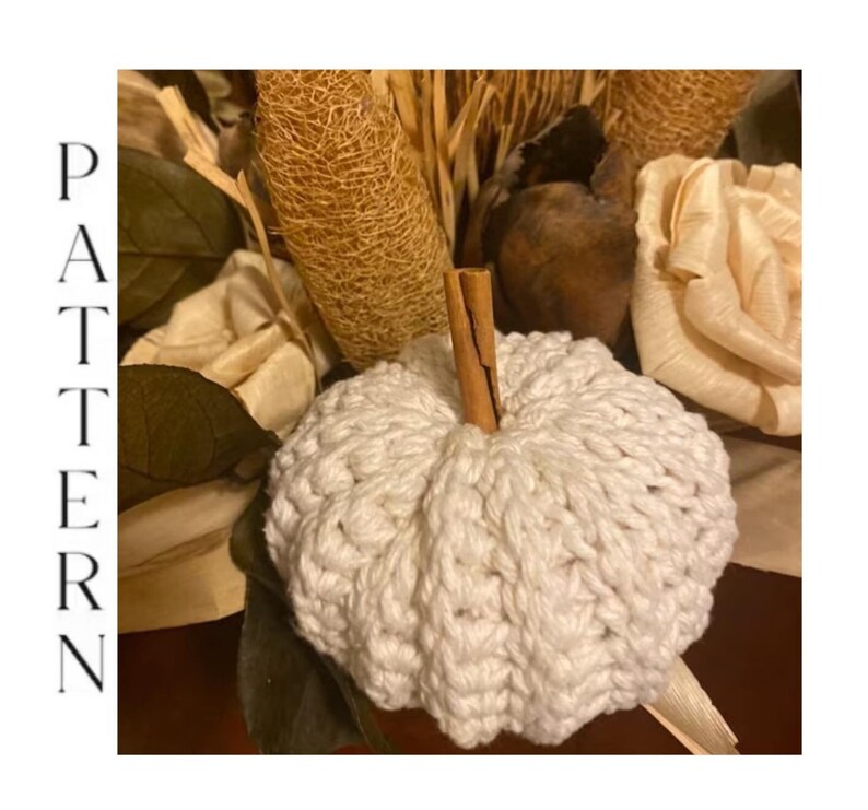 Close-up of handmade crochet pumpkin showing the textured crochet stitches and pumpkin shape