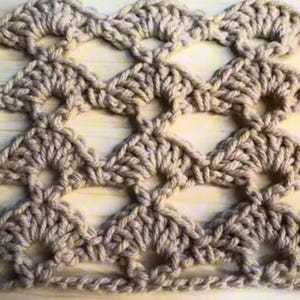 May include: A set of three ceramic mugs with a speckled, matte finish. The mugs are in shades of cream, light gray, and dark gray. Each mug has a simple, minimalist design, perfect for coffee or tea.