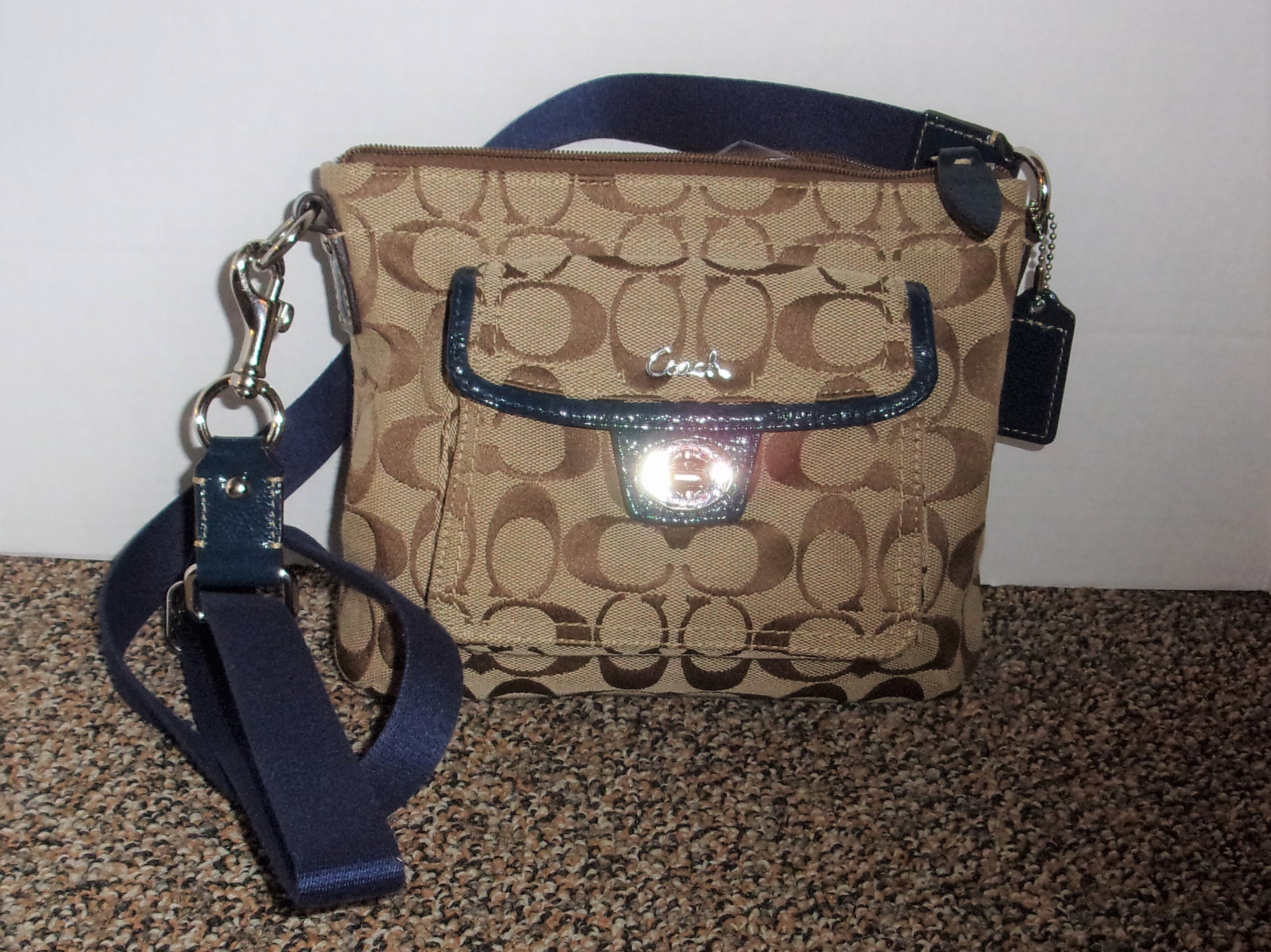 coach white sling bag