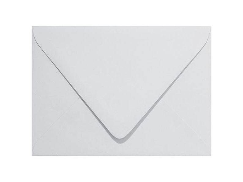 May include: A white envelope with a pointed flap.