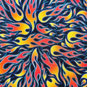 May include: A black background with a repeating pattern of yellow, orange, and red flames. The flames are outlined in blue.