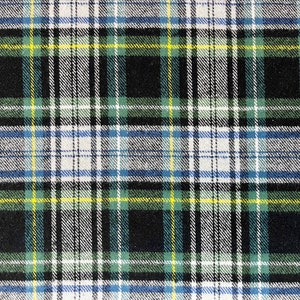 May include: A close-up of a plaid fabric with a black, white, green, and blue pattern.