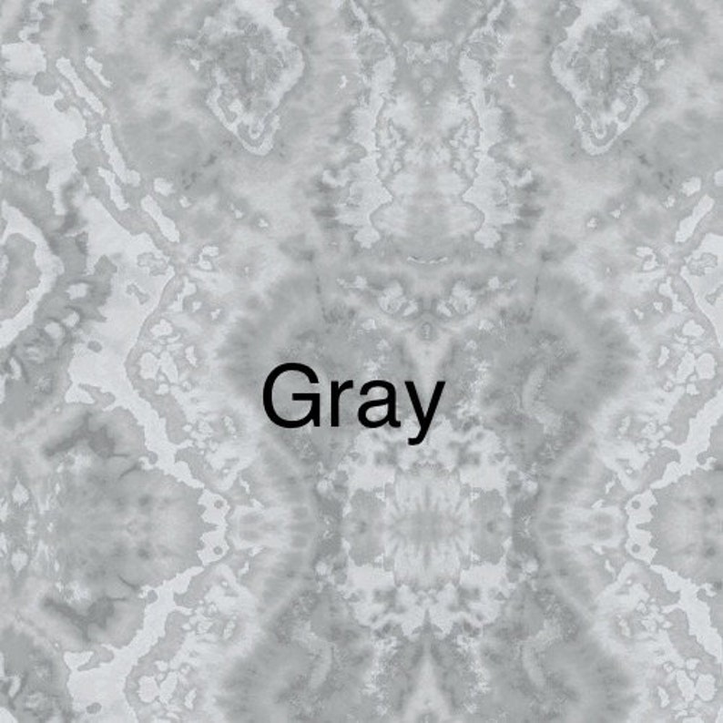 May include: A close-up of a grey, textured surface with a white, stylised word "Gray" printed on it.