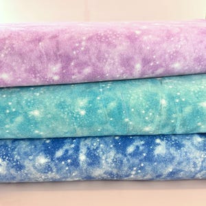 Fun Flannel Galaxy Stars Fabric By The Yard 100% Cotton by Oasis Fabrics night sky star starry navy turquoise lilac double-brushed