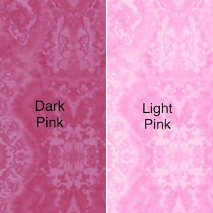 May include: Two fabric swatches, one dark pink and one light pink. Both fabrics have a marbled, tie-dye pattern.