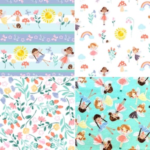 May include: Four different fabric patterns featuring fairies, flowers, butterflies, rainbows, and suns. The patterns are on a white, light blue, and turquoise background.