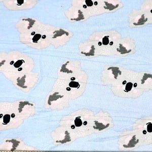 Baby Koalas on Blue Gray Knit Fabric by the Yard Super Soft Jersey 58” Double Brushed 4-way Stretch by Fabric Merchants animals koala toss