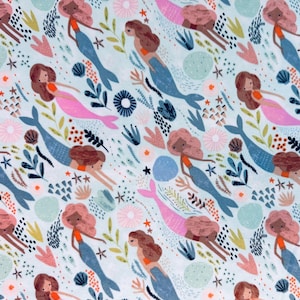 May include: A light blue fabric featuring a repeating pattern of mermaids, sea plants, and starfish. The mermaids have brown hair, orange tops, and blue or pink tails. The design includes various shades of blue, pink, and green.