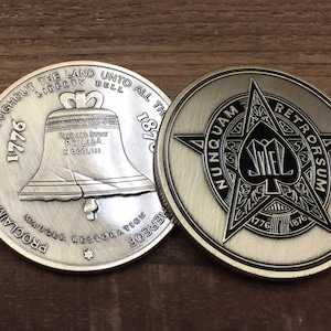 Moneda de distribuidores de 2" de la Exposición del Centenario de Mauger