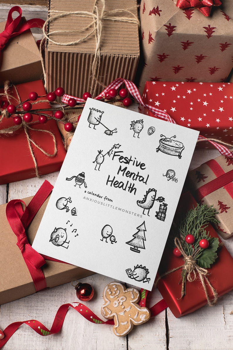 May include: A festive scene with wrapped gifts, red ribbons, and a calendar titled "Festive Mental Health." The calendar features whimsical black and white illustrations. A gingerbread man and sprigs of berries add to the holiday theme.