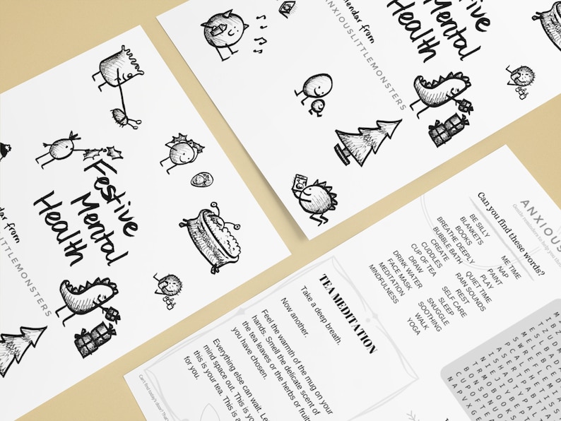 May include: A collection of white paper prints with black ink illustrations and text. The prints feature whimsical drawings of creatures, a Christmas tree, and the words "Festive Mental Health" and "Tea Meditation".