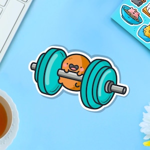 May include: A cartoon illustration of a small orange character lifting a barbell with turquoise weights. The character has a happy expression and is holding the barbell with its arms.