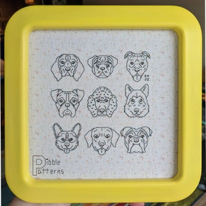 Può includere: Una cornice gialla con sfondo bianco che presenta nove disegni in bianco e nero di diverse razze di cani. Il testo "Dibble Patterns" è nella parte inferiore della cornice.