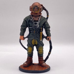 Tin miniature. Pewter sculpture. Tin soldier. Diver