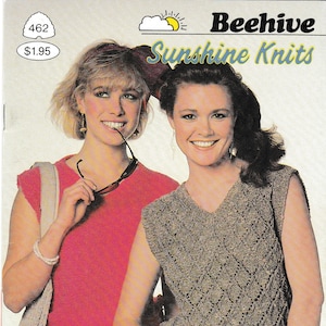 May include: Two women wearing sleeveless tops, one in pink and one in brown, against a white background. The woman in the brown top is holding a pair of sunglasses. The text "Beehive Sunshine Knits Ensoleillez Vos Tricots" is printed on the image.