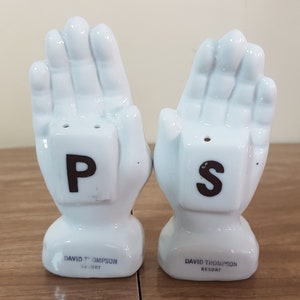 Vintage Salt and Pepper Shakers White Praying Hands Souvenir David Thompson Resort